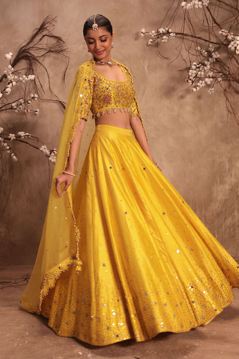 Nazakat Yellow Heavy Mirror work Lehenga Set
