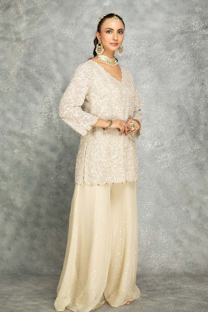 Ivory White Heavy Embroidered Short Kurta with Sharara Style Pants and Net Dupatta