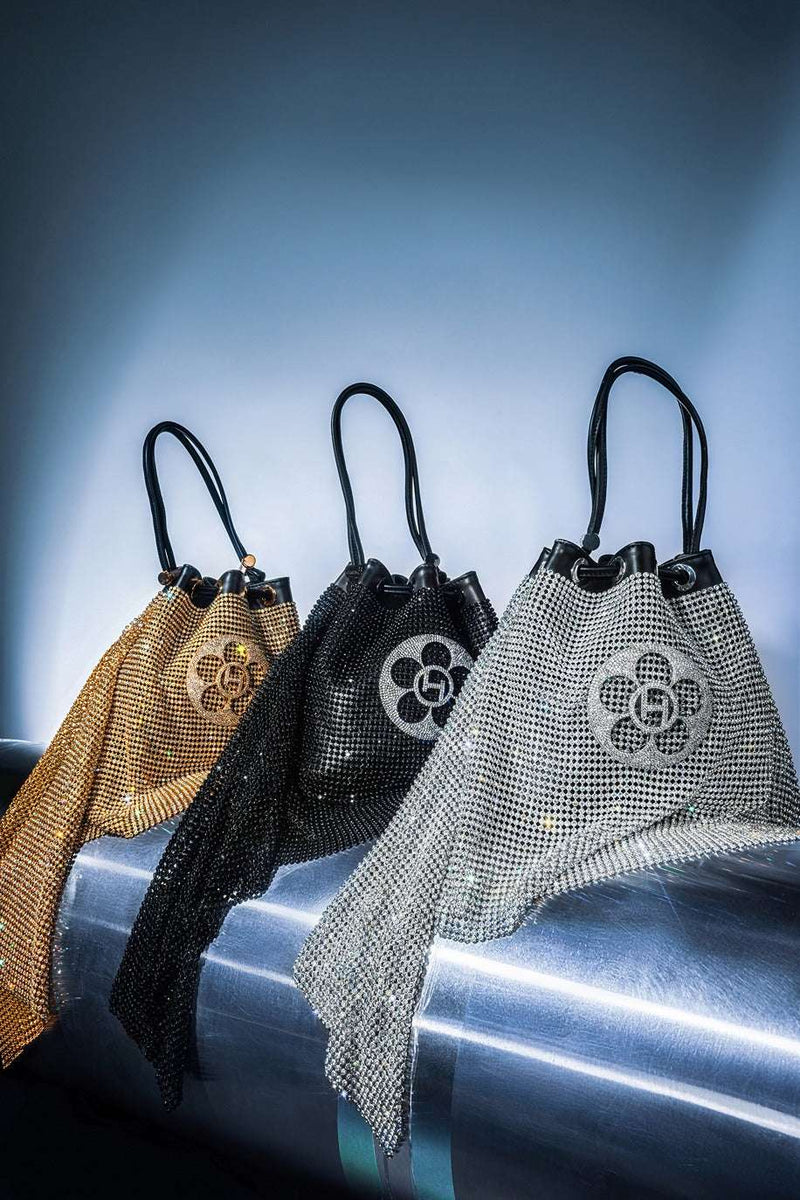 The Crystal Poppi Bucket Bag In Midnight Black