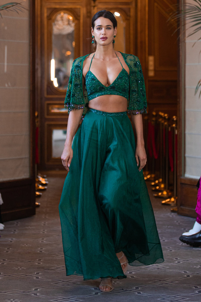 Green embroidered bustier with cape and flared palazzo