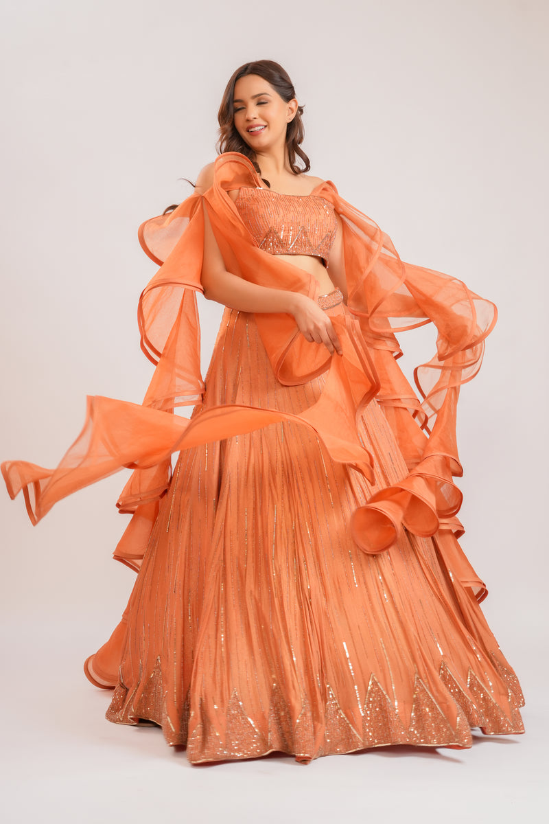 Surkh ruffle lehenga