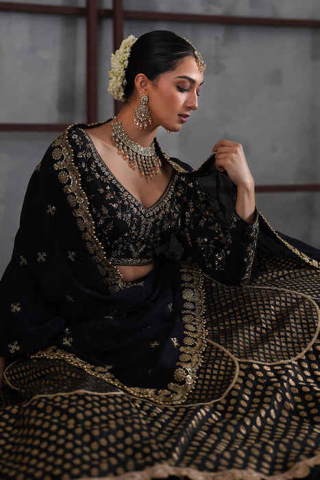 Black embroidered blouse and brocade lehanga