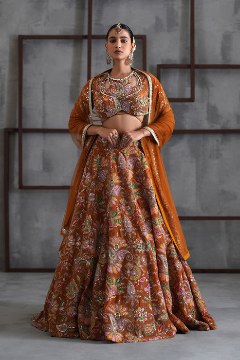Mustard printed blouse, lehenga and dupatta