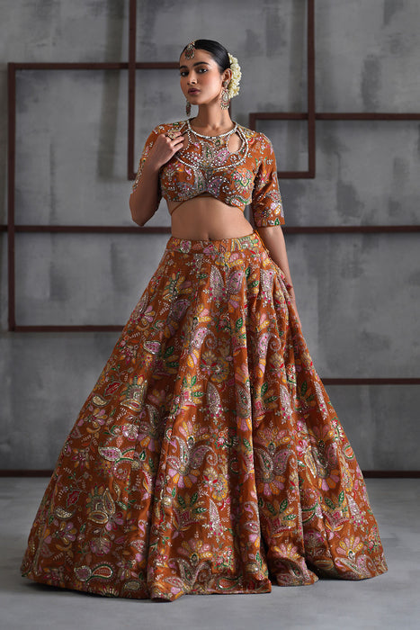 Mustard printed blouse, lehenga and dupatta