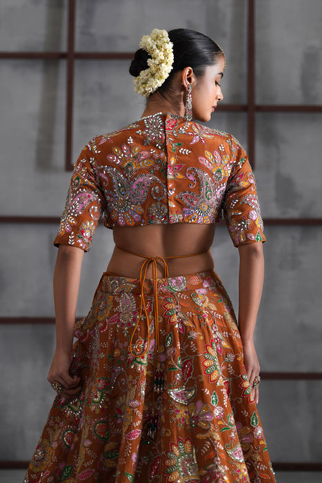Mustard printed blouse, lehenga and dupatta