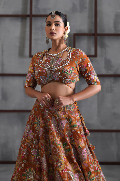 Mustard printed blouse, lehenga and dupatta