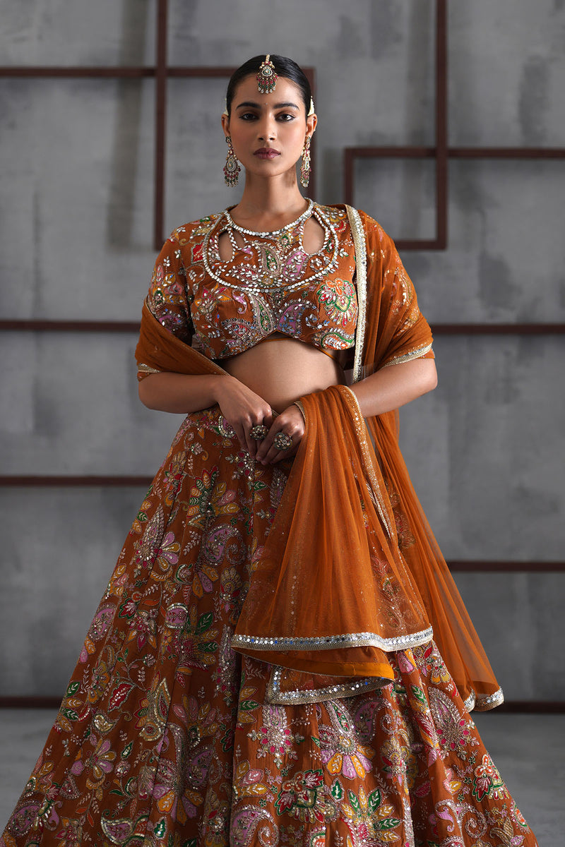 Mustard printed blouse, lehenga and dupatta