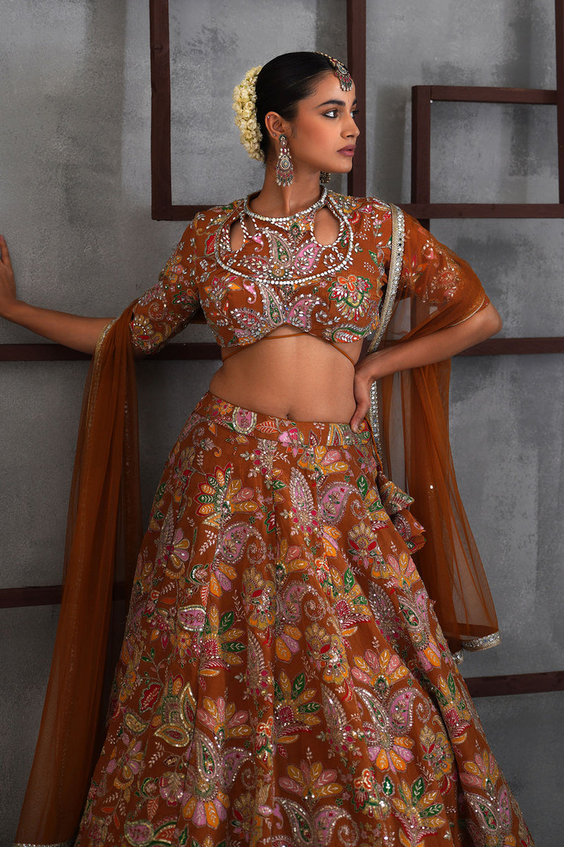 Mustard printed blouse, lehenga and dupatta