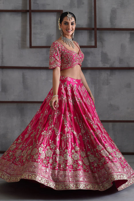 Fuchshia embroidered blouse, lehenga and dupatta