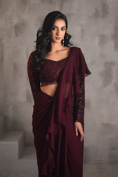 Wine embroidered blouse, draped ruffle saree
