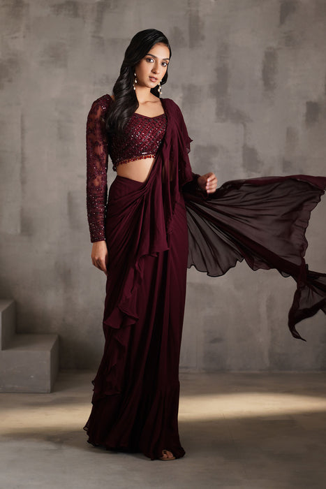 Wine embroidered blouse, draped ruffle saree