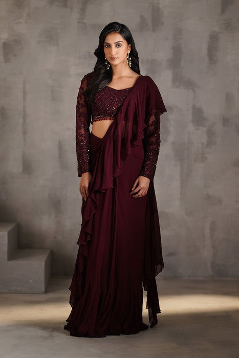 Wine embroidered blouse, draped ruffle saree