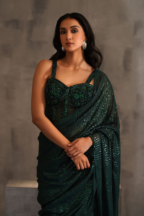 Bottle green embroidered corset and drape saree