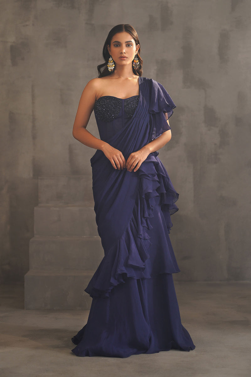 Navy blue embroidered bustier and drape saree