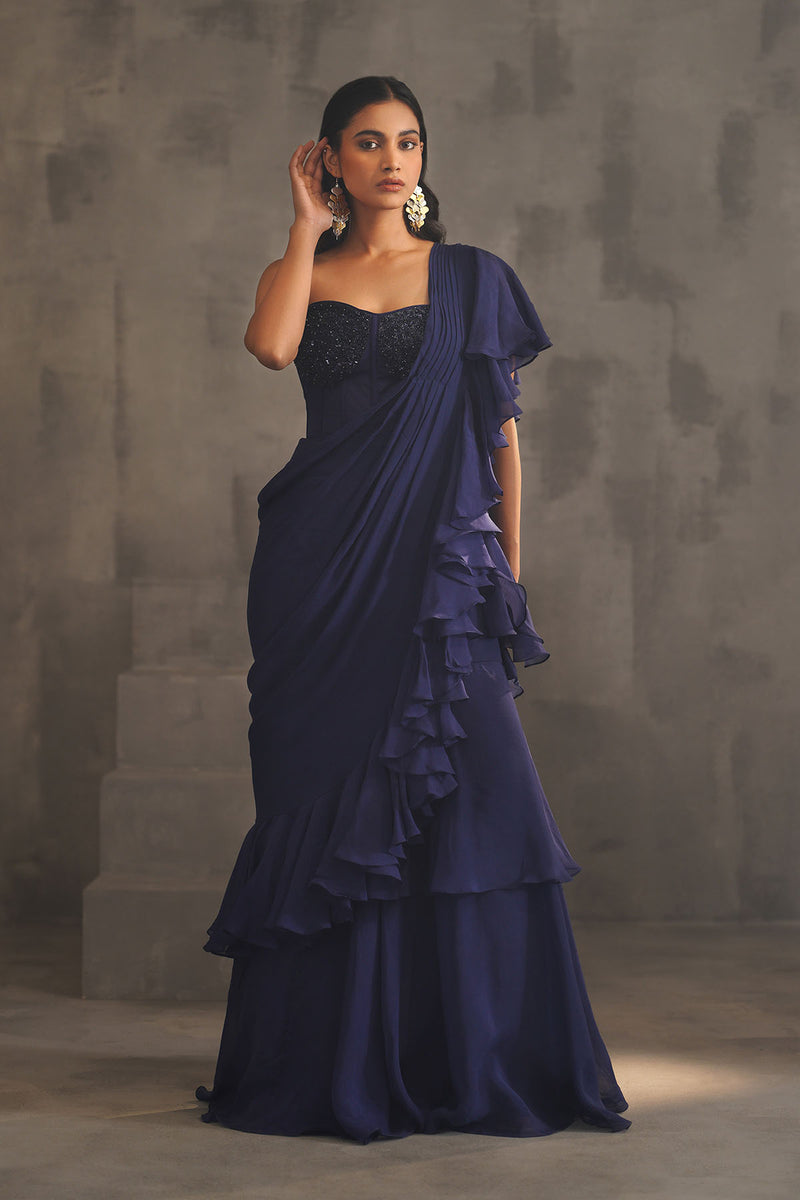 Navy blue embroidered bustier and drape saree