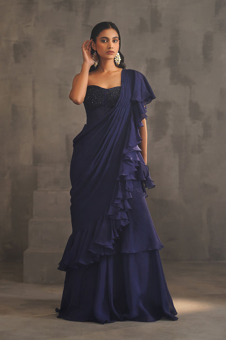 Navy blue embroidered bustier and drape saree