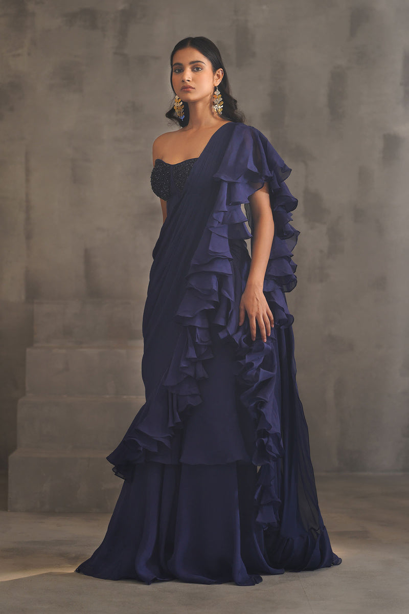 Navy blue embroidered bustier and drape saree