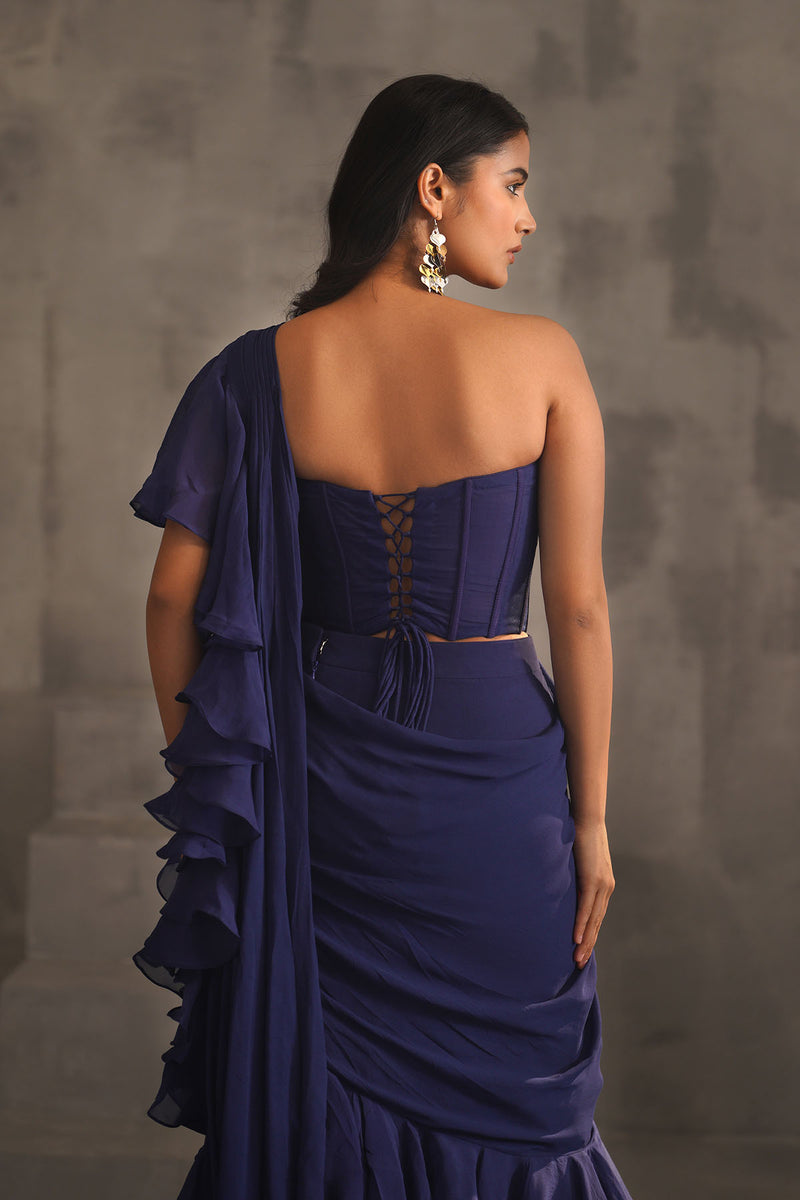 Navy blue embroidered bustier and drape saree