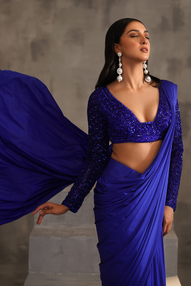 Royal blue embroidered blouse and drape lycra saree