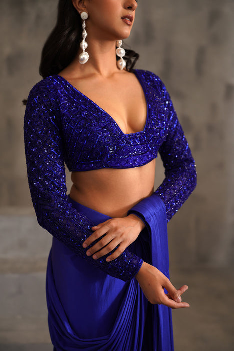 Royal blue embroidered blouse and drape lycra saree