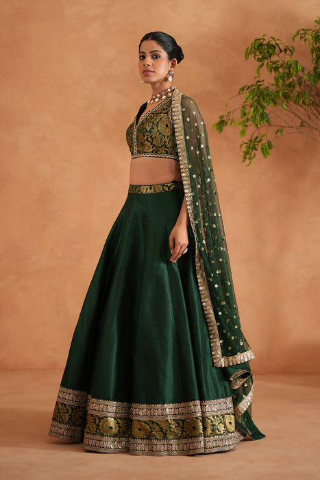 Bottle green Brocade Blouse, Lehenga and Dupatta