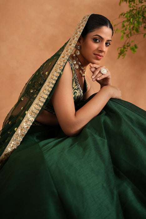 Bottle green Brocade Blouse, Lehenga and Dupatta