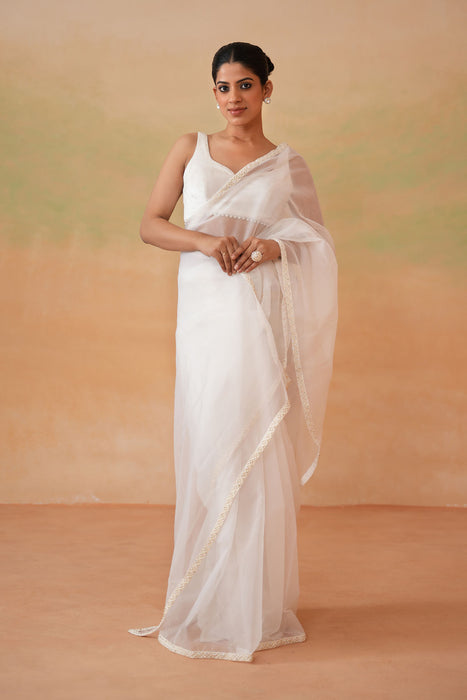 Ivory blouse, Stitched saree