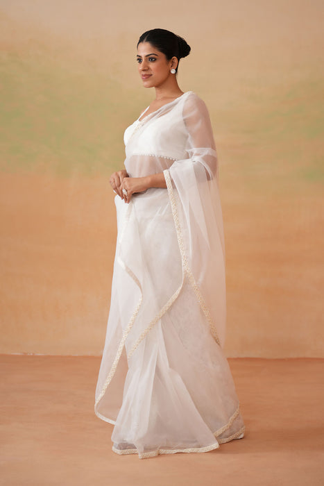 Ivory blouse, Stitched saree