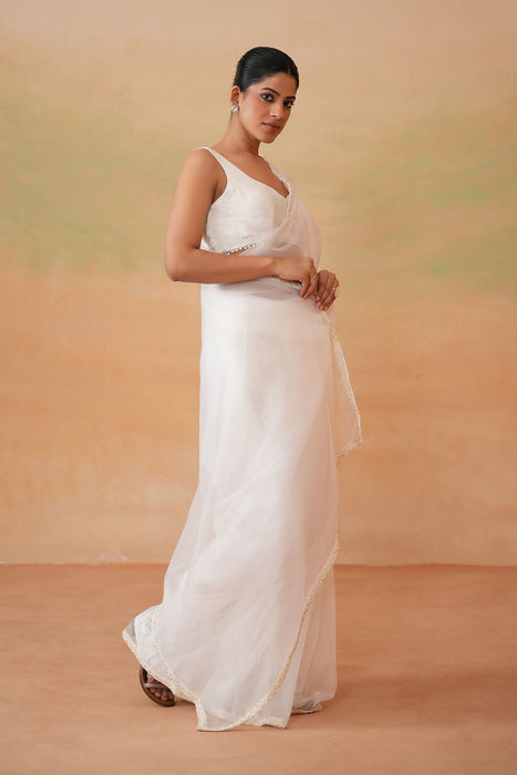 Ivory blouse, Stitched saree