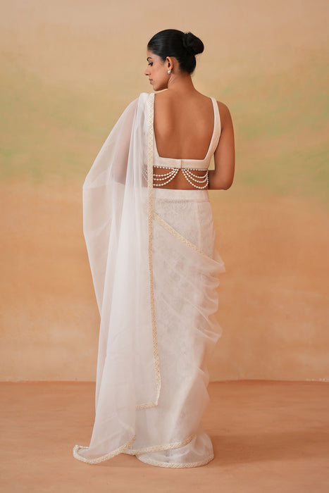 Ivory blouse, Stitched saree