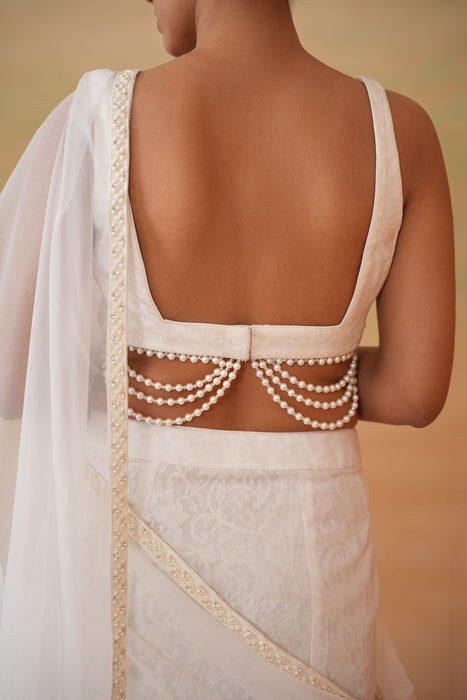 Ivory blouse, Stitched saree