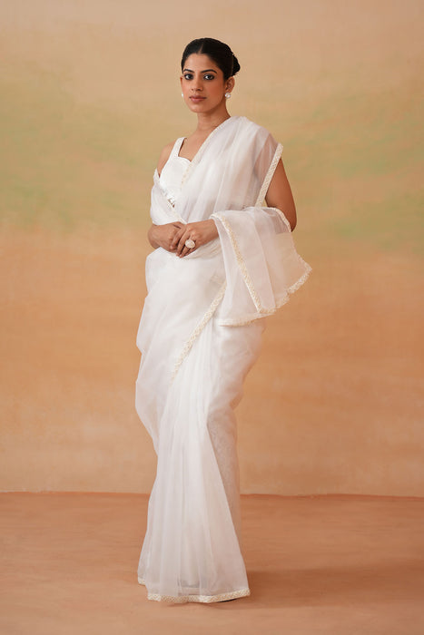 Ivory blouse, Stitched saree