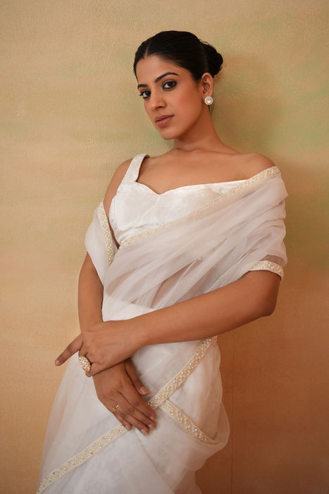 Ivory blouse, Stitched saree