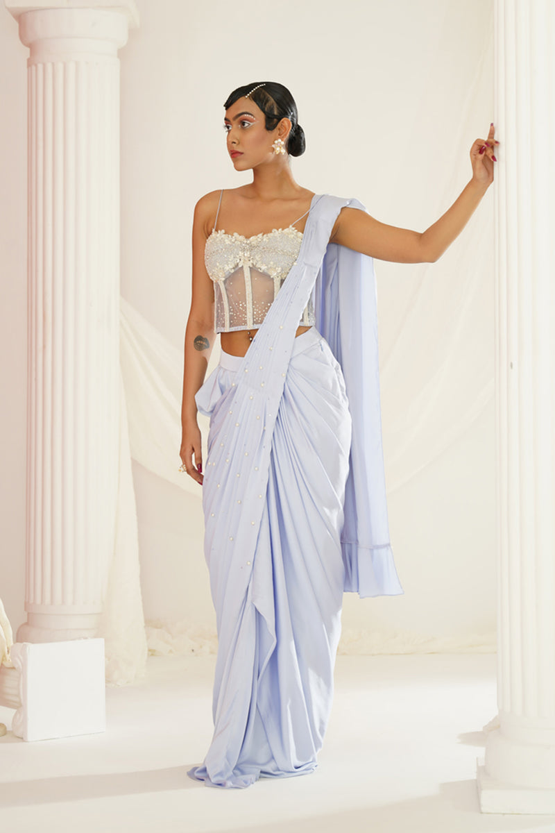 Powder blue embroidered corset blouse with
 ready to wear drape saree set