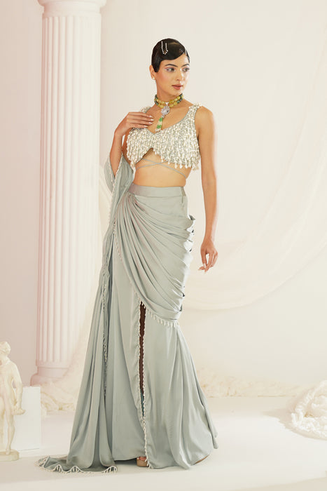 Sage green embroidered blouse with
 ready to wear drape saree set