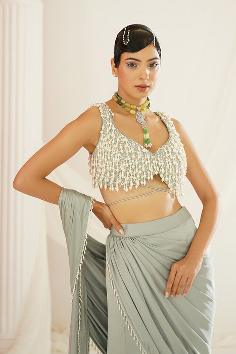 Sage green embroidered blouse with
 ready to wear drape saree set