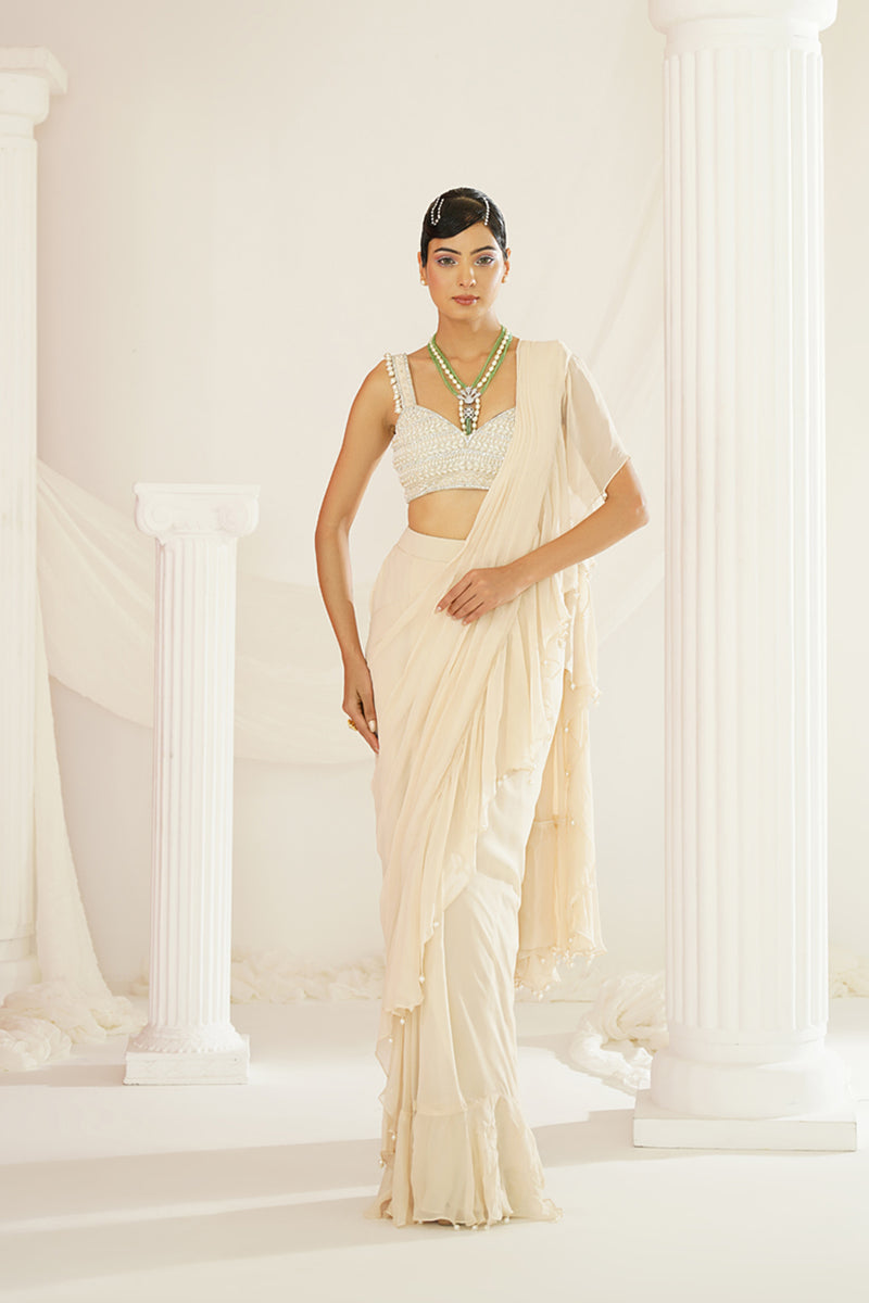 Ivory embroidered blouse with ready to wear ruffle saree set