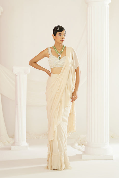 Ivory embroidered blouse with ready to wear ruffle saree set