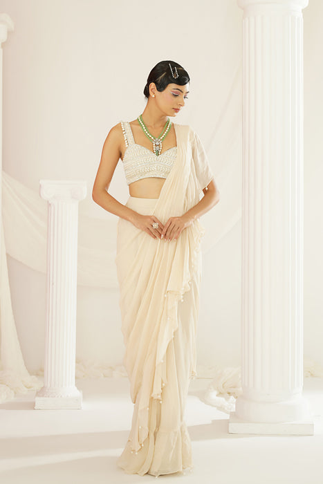 Ivory embroidered blouse with ready to wear ruffle saree set