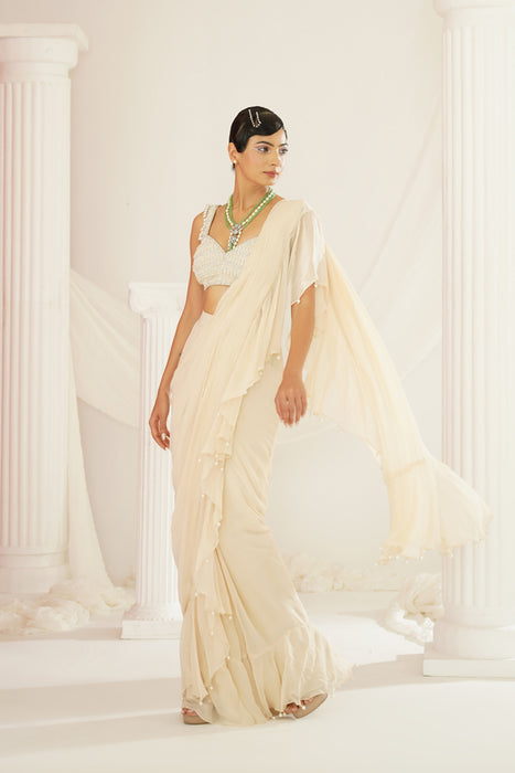 Ivory embroidered blouse with ready to wear ruffle saree set