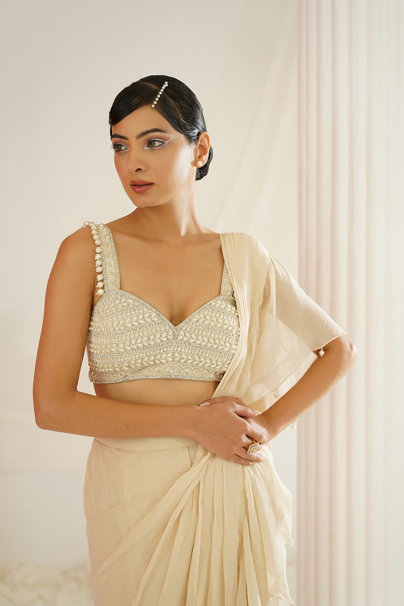 Ivory embroidered blouse with ready to wear ruffle saree set