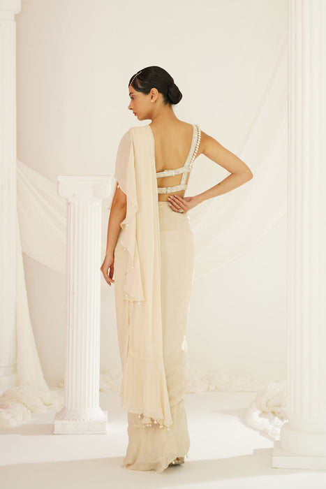 Ivory embroidered blouse with ready to wear ruffle saree set