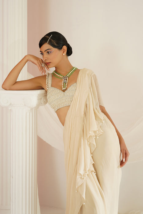 Ivory embroidered blouse with ready to wear ruffle saree set