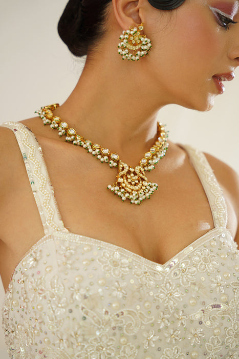 White embroidered sharara with pelpum and dupatta set