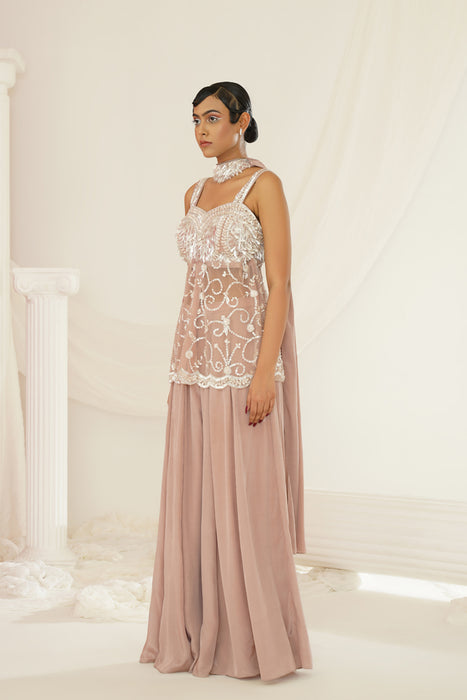 Nude sharara set with pelpum and dupatta