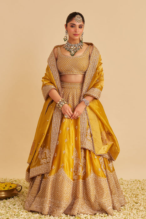Aashina  - Dabka Zardozi Embroidered Pure Tissue Mustard Lehenga Set