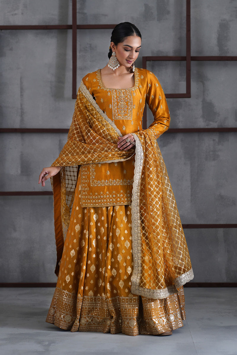 Mustard embroidered kurti, brocade lehenga and dupatta