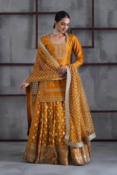 Mustard embroidered kurti, brocade lehenga and dupatta