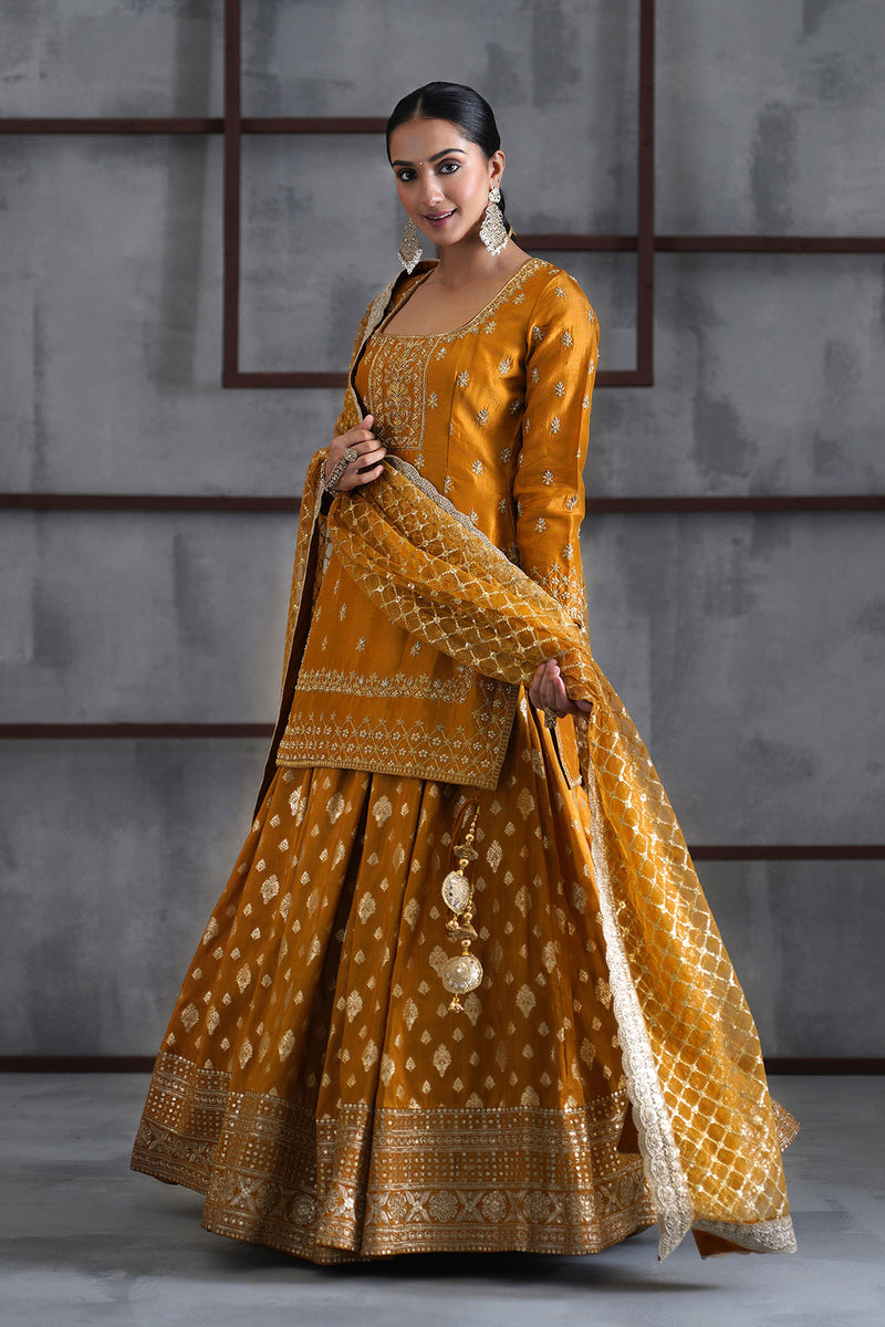 Mustard embroidered kurti, brocade lehenga and dupatta