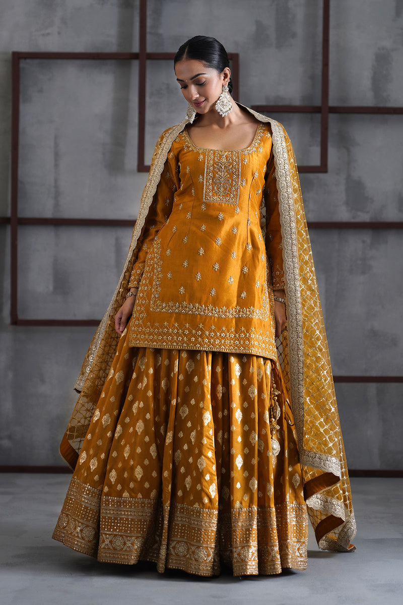 Mustard embroidered kurti, brocade lehenga and dupatta